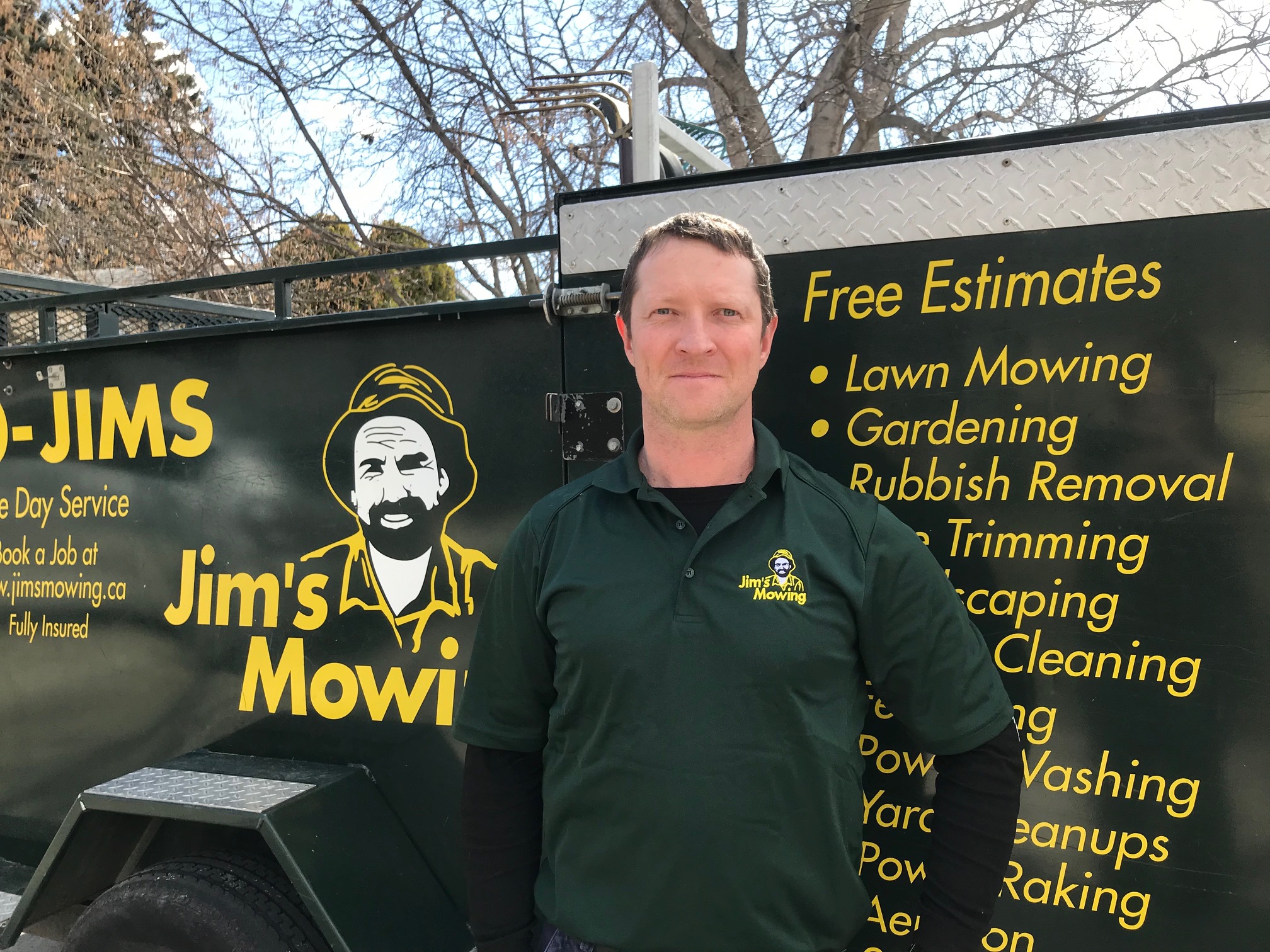 Kyle Deverill our Jim’s Mowing franchisee in Penticton, Naramata, Summerland, Kaledan and Okanagan Falls in front of his trailer 4 Kyle-Deverill-our-Jims-Mowing-franchisee